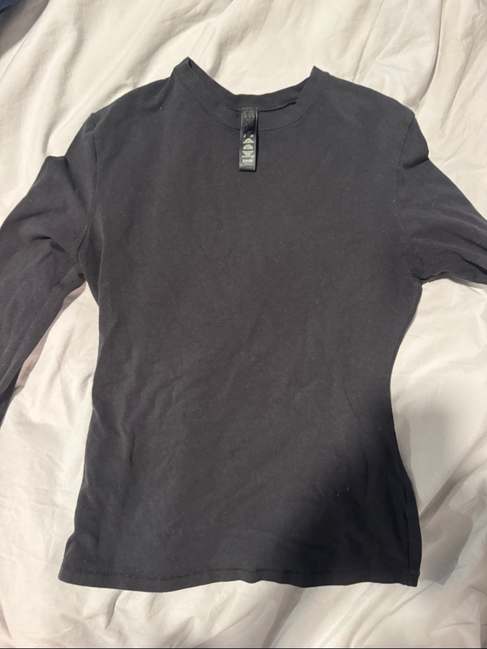 Skims women’s long sleeve black tee